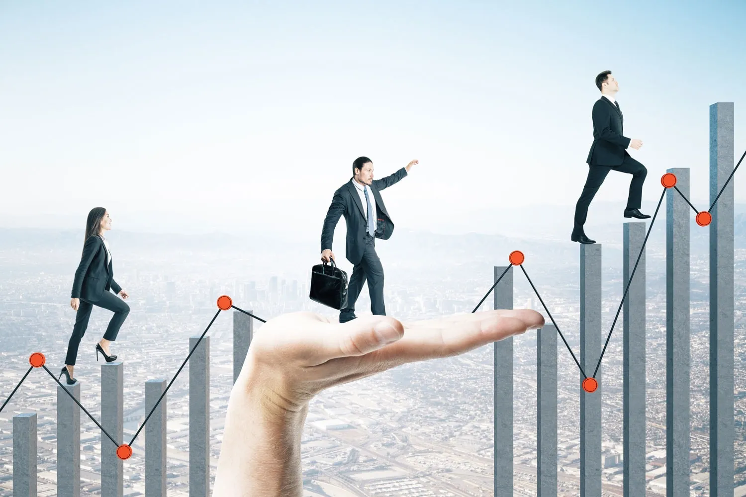 A composite illustration in which three people in business suits climb a rising bar chart above a hazy city skyline, one of them stepping onto a giant open hand.